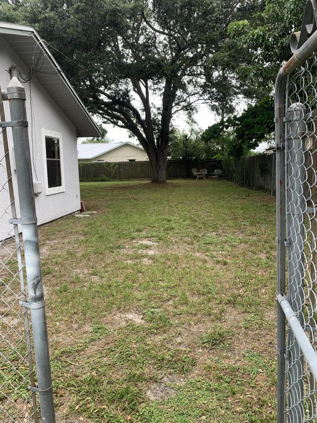 Photo of 2101 SW Idaho Lane, Port Saint Lucie, FL 34953 (MLS # R11016724)