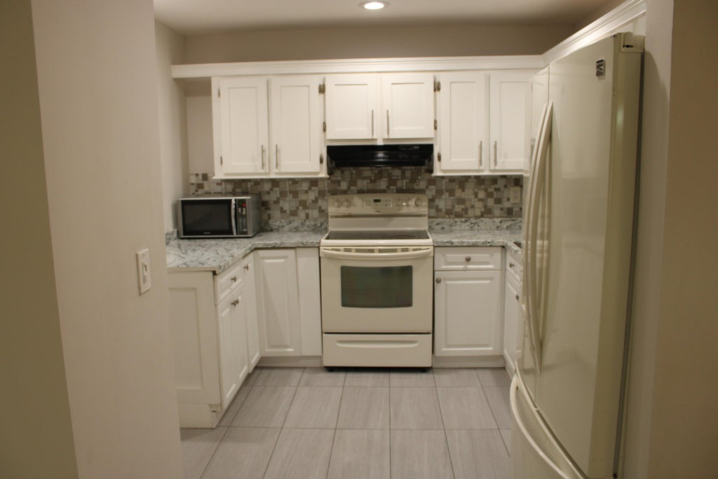 Photo of 5337 NW 5th Street, Delray Beach, FL 33445 (MLS # B26069033)