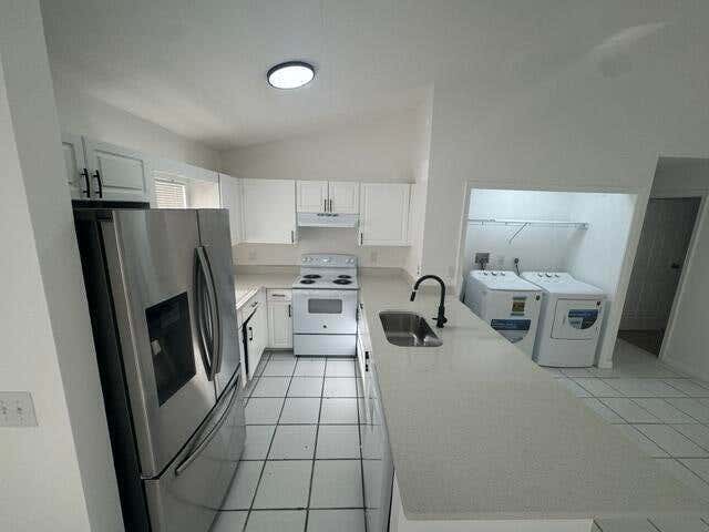 Photo of 1046 GOLDENROD RD #1048, Wellington, FL 33414 (MLS # B26058275)