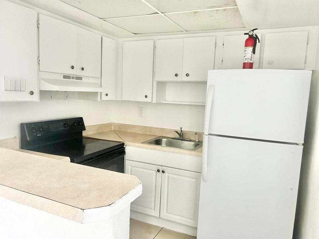 Photo of 2240 NW 59TH Terrace #1-4, Lauderhill, FL 33313 (MLS # B26091330)
