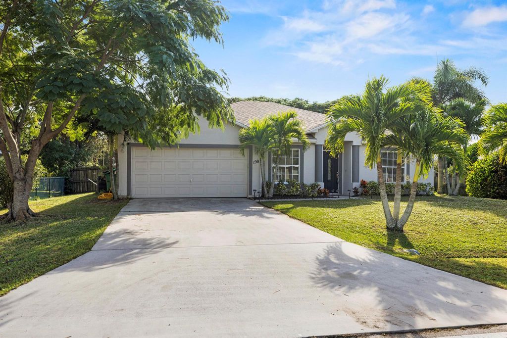 Photo of 198 SW Glenwood Drive, Port Saint Lucie, FL 34984 (MLS # R10940308)