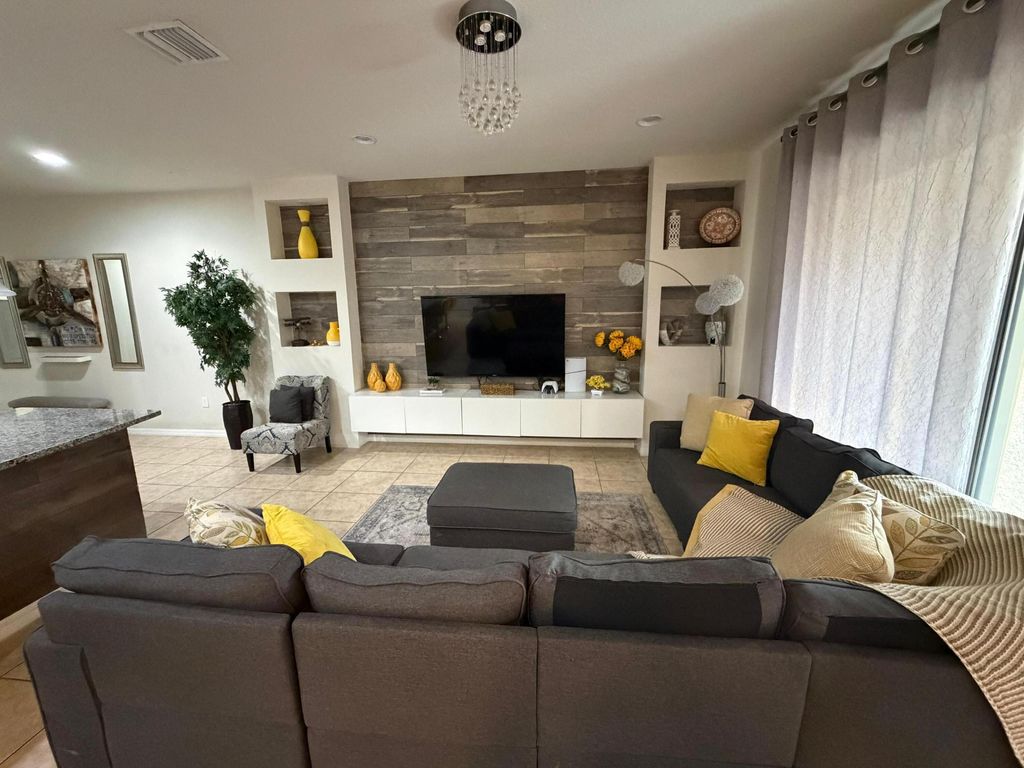 Photo of 9029 Rhodes Street, Kissimmee, FL 34747 (MLS # B26011020)