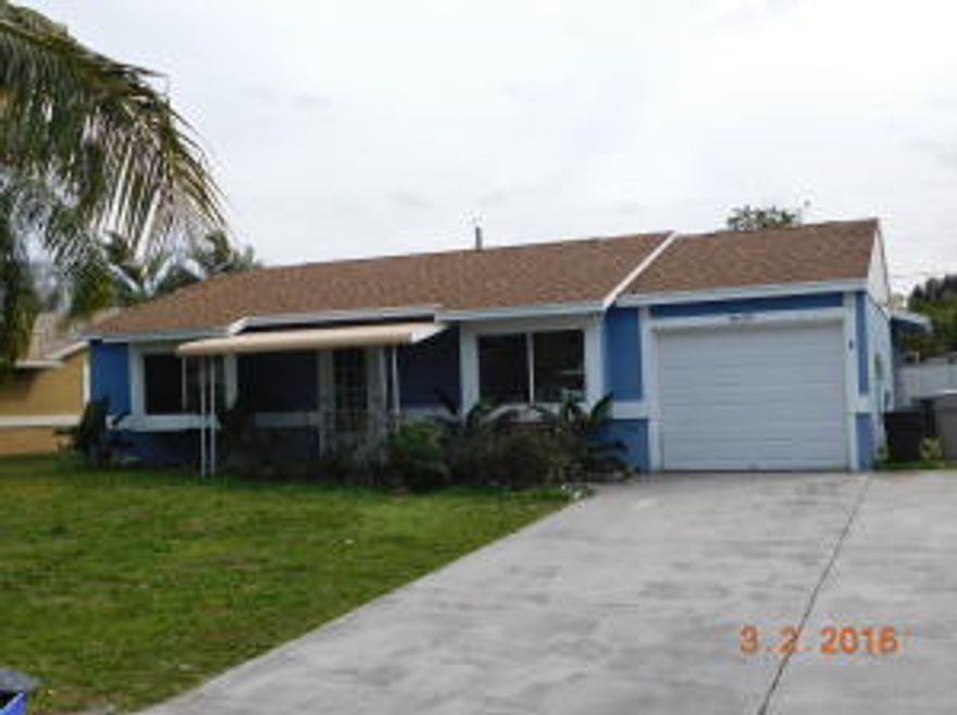 DONT MISS THIS DEAL..SINGLE FAMILY HOME WITH NEWER ROOF, REMODELED KITCHEN AND BATHS, NEWER WINDOWS, TILE AND LAMINATE FLOORING THROUGHOUT, HURRICANE RATED GARAGE DOOR, HURRICANE SHUTTERS FOR WINDOWS, VERY LARGE PRIVATE LOT, FRENCH DOORS TO THE YARD.  THE ROOM BEHIND THE KITCHEN IS LARGE ENOUGH FOR A DINING AREA OR FAMILY ROOM, OR BOTH DEPENDS ON HOW YOU LIVE!  EXTENDED PAVER PATIO, AWNING FOR SHADE, EXTRA PARKING PAD A LOT OF HOUSE FOR THE MONEY! VERY LITTLE RESTRICTION TYPE OF NEIGHBORHOOD! BRING A FEW OF YOUR OWN TOUCHES AND THIS HOUSE BECOMES A GREAT INEXPENSIVE HOME!