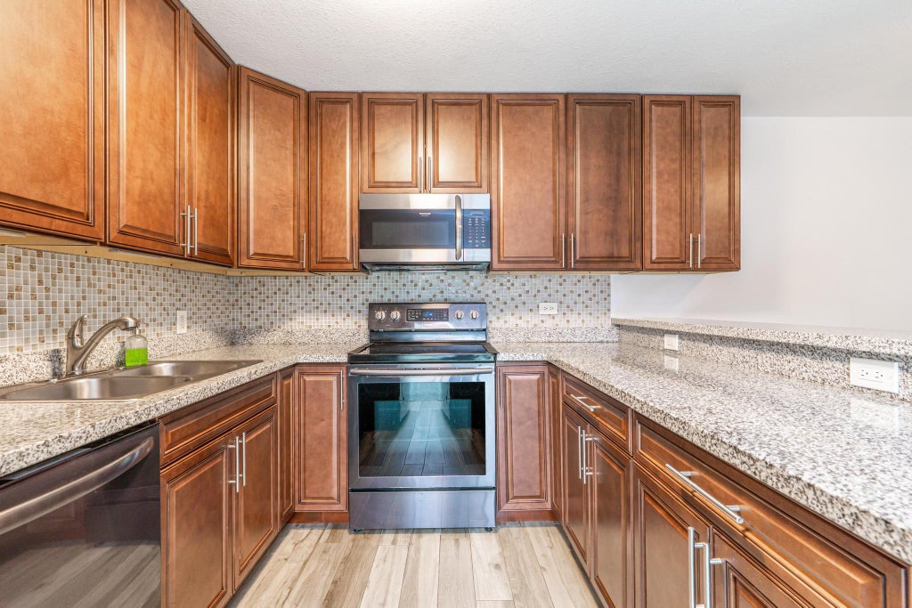 Photo of 821 8th Lane, Palm Beach Gardens, FL 33418 (MLS # R11064325)
