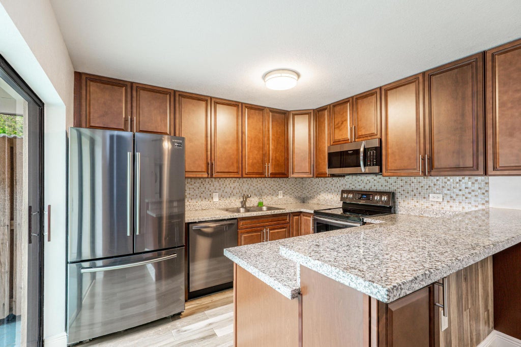 Photo of 821 8th Lane, Palm Beach Gardens, FL 33418 (MLS # R11064325)