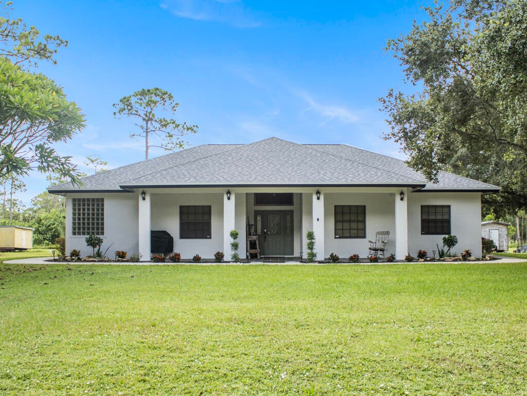 Photo of 14662 78th Place N, Loxahatchee, FL 33470 (MLS # B26065059)