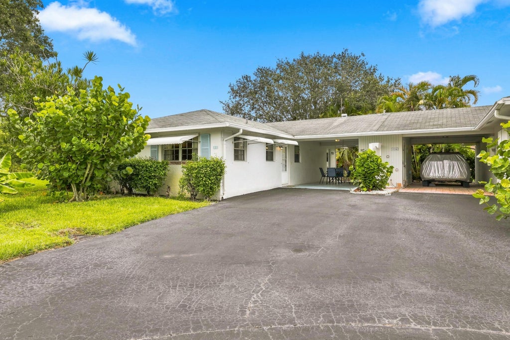 Photo of 435 BLUEBIRD Lane, Delray Beach, FL 33445 (MLS # B26071760)