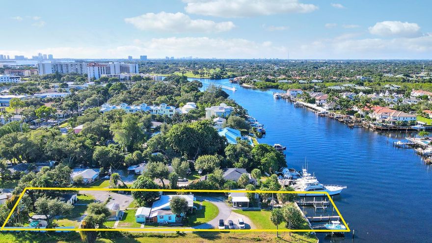 A once-in-a-generation opportunity in Palm Beach Gardens. This is a two parcel combination with one main house and 2 guest cottages, perfect for renovation, income potential, or as the foundation for your new estate.. 2031 Melody Lane and 2021 Melody Lane, gives you .72 acres of waterfront property. It embodies the charm of old Florida with the promise of modern luxury. The property offers 100 feet of deep-water frontage, no fixed bridges, and direct ocean access—ideal for yachts or sport boats. Enjoy breathtaking west-facing sunsets over the Intracoastal from this rare waterfront setting. With no HOA, no restrictions, and medium-density zoning, the possibilities are wide open. This is a rare chance to craft your legacy on the water.
