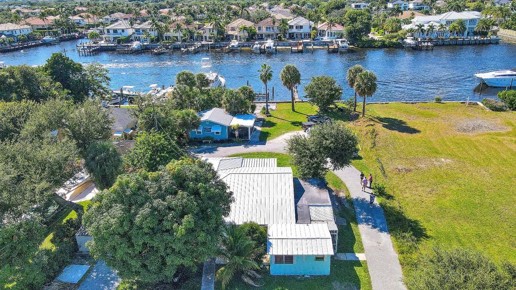 Photo of 2031 Melody Lane, North Palm Beach, FL 33408 (MLS # R11135633)