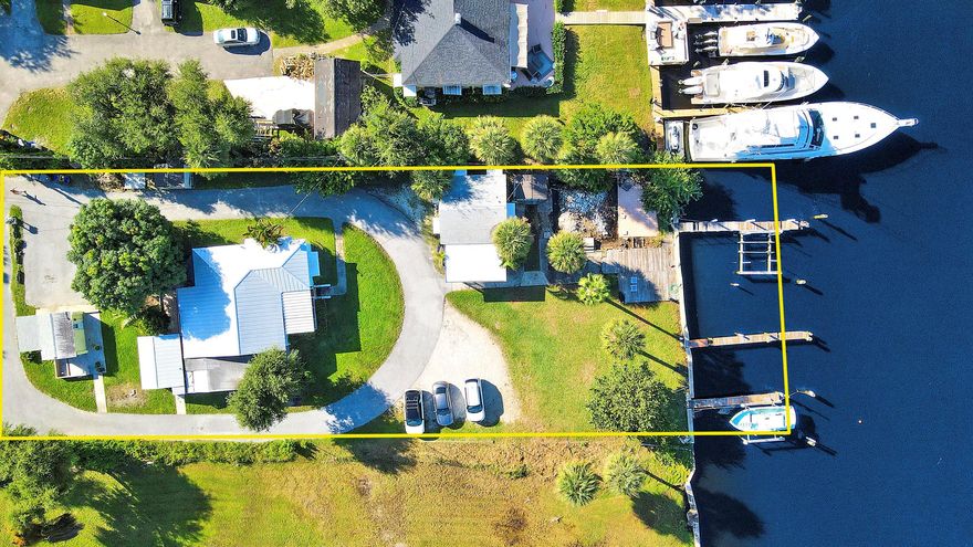 A once-in-a-generation opportunity in Palm Beach Gardens. This is a two parcel combination with one main house and 2 guest cottages, perfect for renovation, income potential, or as the foundation for your new estate.. 2031 Melody Lane and 2021 Melody Lane, gives you .72 acres of waterfront property. It embodies the charm of old Florida with the promise of modern luxury. The property offers 100 feet of deep-water frontage, no fixed bridges, and direct ocean access--ideal for yachts or sport boats. Enjoy breathtaking west-facing sunsets over the Intracoastal from this rare waterfront setting. With no HOA, no restrictions, and medium-density zoning, the possibilities are wide open. This is a rare chance to craft your legacy on the water.