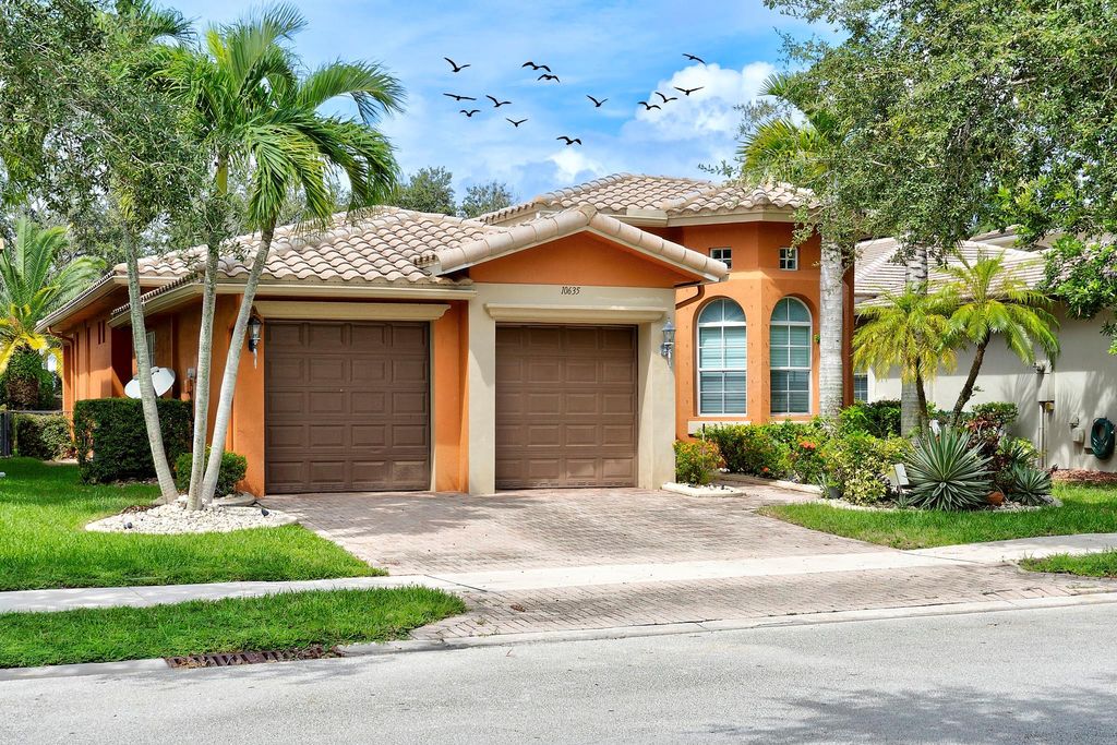 Photo of 10635 NW 83rd Court, Parkland, FL 33076 (MLS # F10528821)