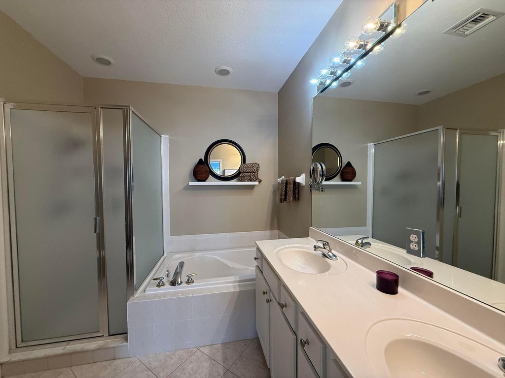 Photo of 8408 Mulligan Circle, Port Saint Lucie, FL 34986 (MLS # B26033444)
