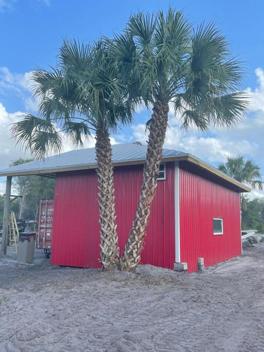 11 acres in western Martin County with barn. Land is well drained, not in a flood zone, no wetlands on the property and no HOA. Very private with entry gate, fenced with many mature oaks. Zoning allows for livestock, nursery production. 2 separate homes or barndo-miniums can be built on this property.