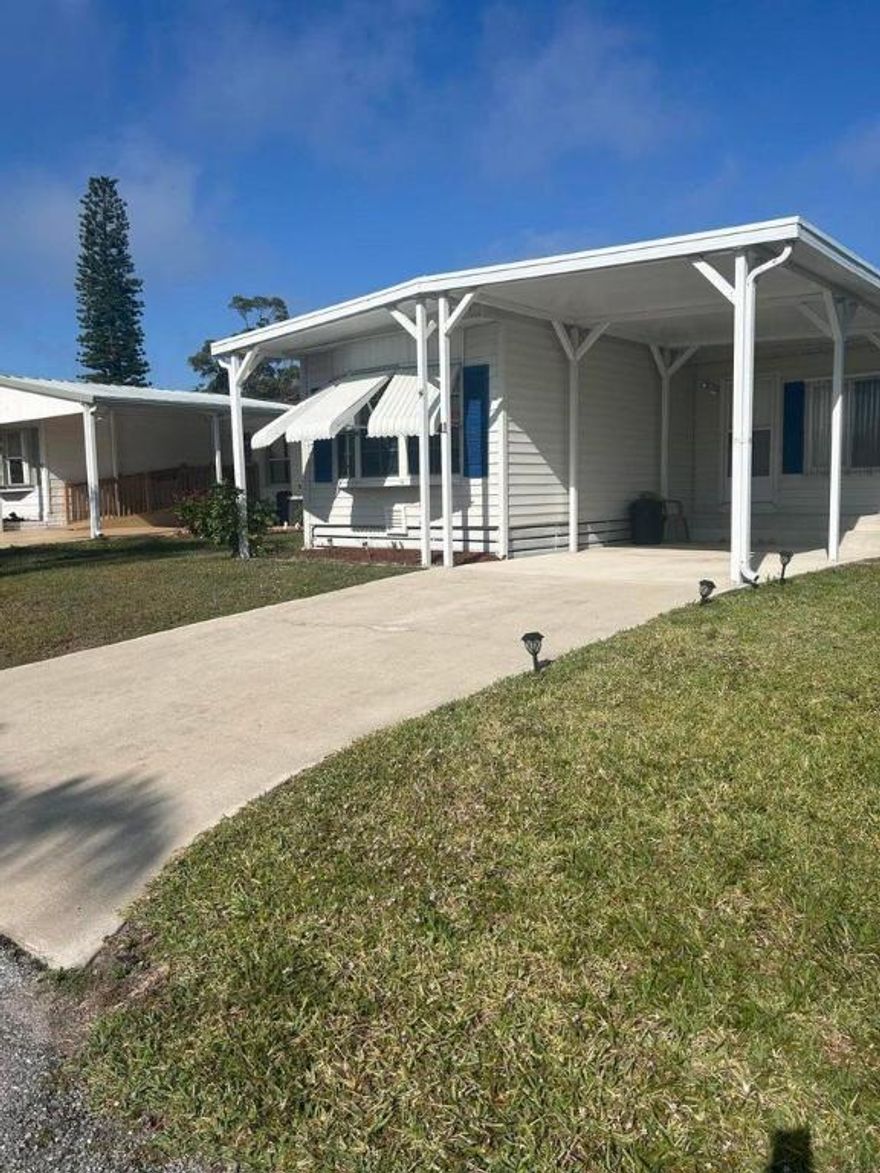 This is a manufactured home in a 52+ and over community, Freshly painted outdoor decorative shutters, AC is ONLY 3 YEARS OLD  very clean furnished and cozy. Its located in Spanish Lakes Golf Village Section. SPANISH LAKES IS A GOLFING COMMUNITY, CLUBHOUSE ACTIVITIES,SWIMMING POOLS , TENNIS AND MUCH MORE.