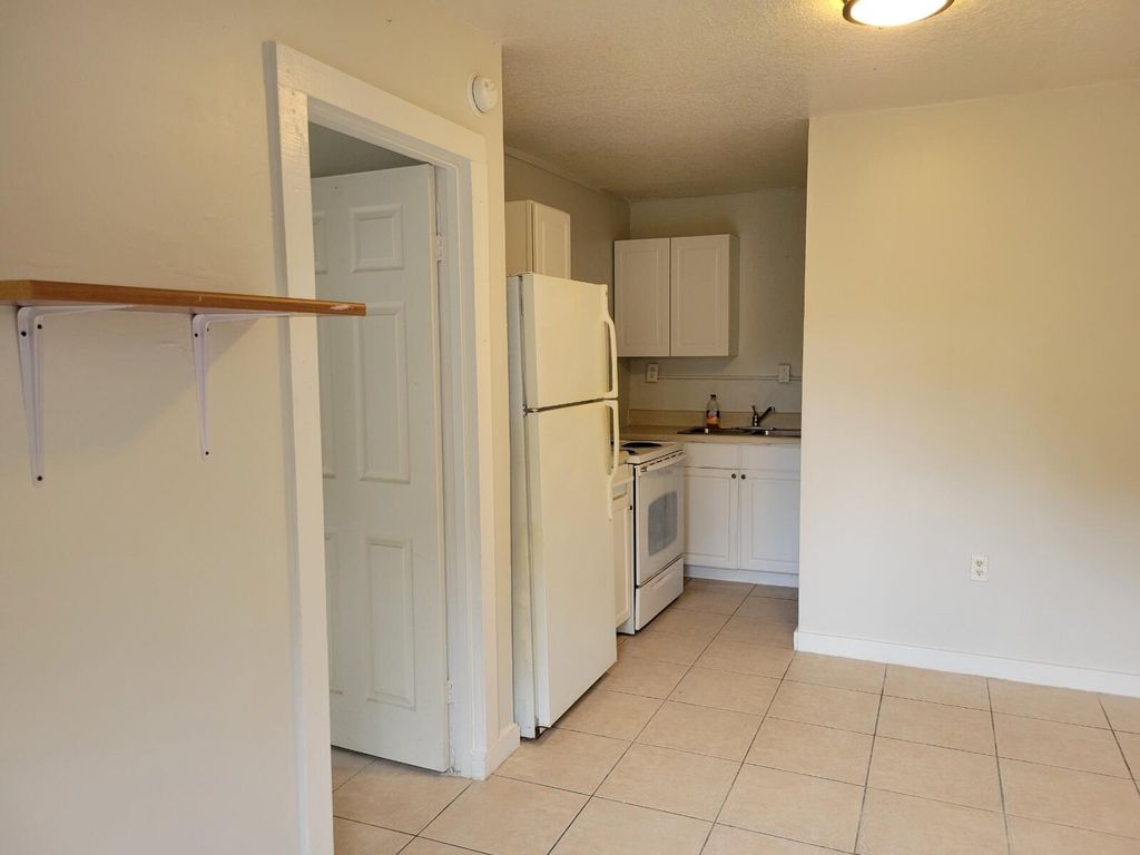 Photo of 433 N 9th Street #C, Fort Pierce, FL 34950 (MLS # R10964137)