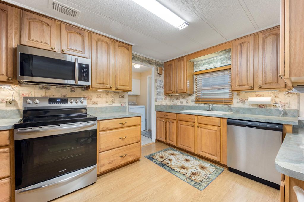 Photo of 2834 SW Pontiac Place, Stuart, FL 34997 (MLS # R10939162)