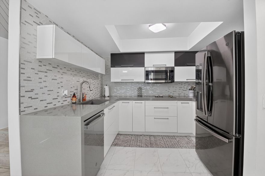 Nicely updated, very spacious three-bedroom, three full bathroom rental in East Delray Beach! Modern European-style kitchen and tile floors. Very large outdoor patio perfect for relaxing, grilling, or hosting friends and family. The unit is offered fully furnished, just bring your toothbrush! 5 minutes to downtown Delray and conveniently located near the highway for quick access this is the perfect central location to be near everything you want.