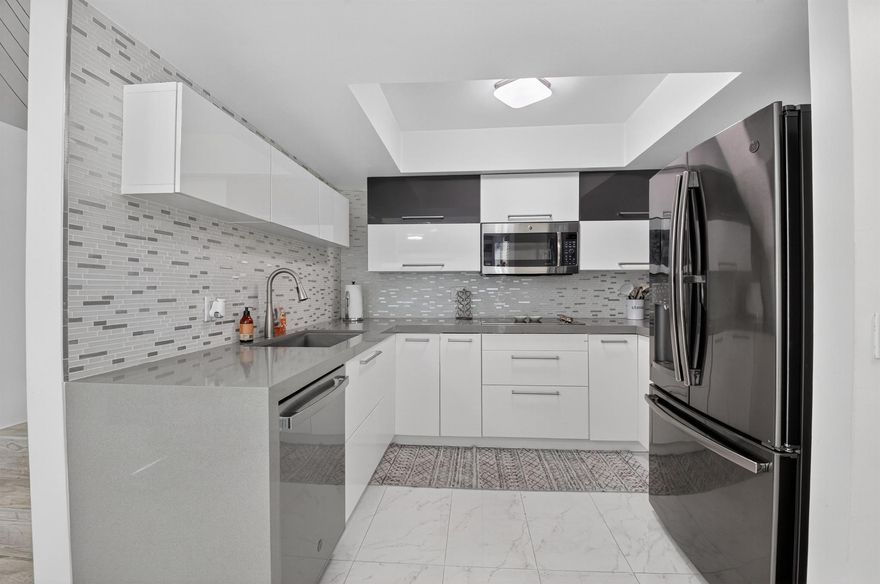 Nicely updated, very spacious three-bedroom, three full bathroom rental in East Delray Beach! Modern European-style kitchen and tile floors. Very large outdoor patio perfect for relaxing, grilling, or hosting friends and family. The unit is offered fully furnished, just bring your toothbrush! 5 minutes to downtown Delray and conveniently located near the highway for quick access this is the perfect central location to be near everything you want.