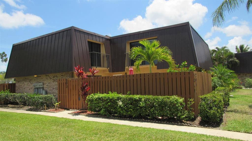 Photo of 5840 SE Windsong Lane #203, Stuart, FL 34997 (MLS # R10719248)