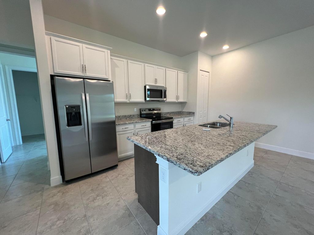 Photo of 5883 Pinetree Drive, Fort Pierce, FL 34982 (MLS # R11025392)