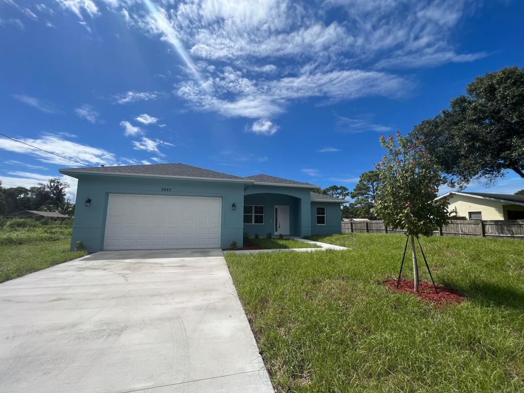 Photo of 5883 Pinetree Drive, Fort Pierce, FL 34982 (MLS # R11025392)