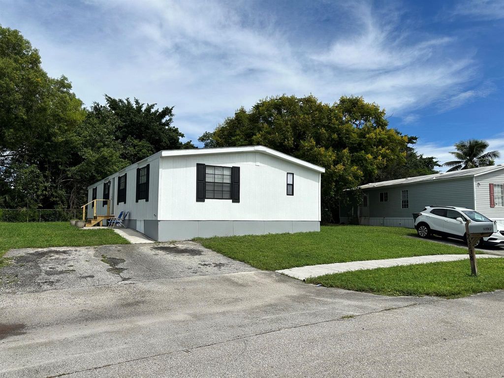 Photo of 23138 Surf Rd, Boca Raton, FL 33428 (MLS # R11130299)