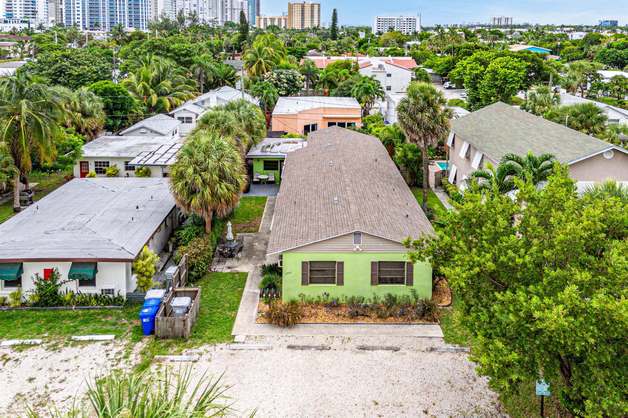 This 4 plex + Efficiency building is literally...steps to the sand! Located in Pompano's hottest Beach Development area. The owner has meticulously maintained the building with new roof in 2017. Offering guests a Tropically landscaped court yard with BBQ area perfect for soaking up the sun. Unit 3 has a new central a/c + private fenced yard in the back. The flexible building floor plan allows you to run as a 5 plex or combine 2 units creating a spacious 2 bedrooom plus living room - owner's suite. Strong income producer has plenty of room for growth.