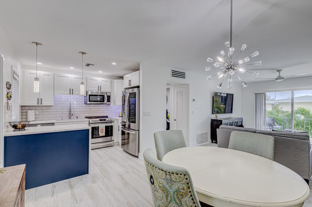 Photo of 813 Hummingbird Way #6a, North Palm Beach, FL 33408 (MLS # R10948861)