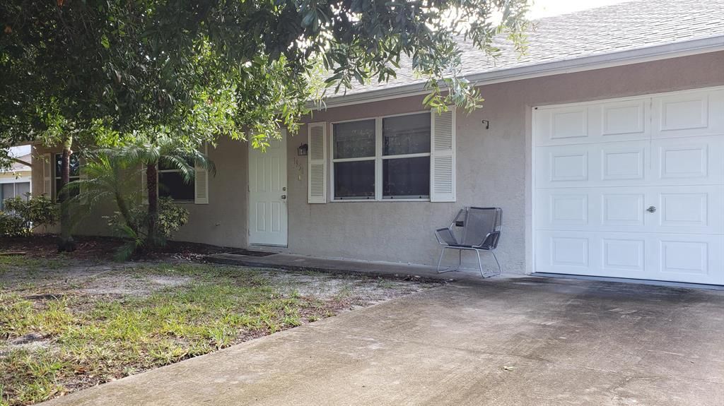 Photo of 1951 SW Agnes Street, Port Saint Lucie, FL 34953 (MLS # R10721352)