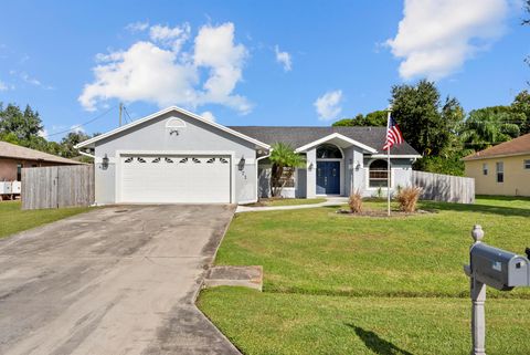 Photo of 471 SE Ron Rico Terrace, Port St Lucie, FL 34983 (MLS # R11135100) Photo of 471 SE Ron Rico Terrace, Port St Lucie, FL 34983 (MLS # R11135100)