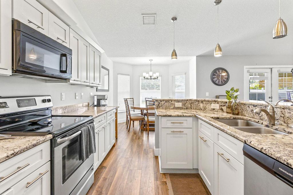 Photo of 5533 NW Cordrey Street, Port Saint Lucie, FL 34986 (MLS # R11101404)