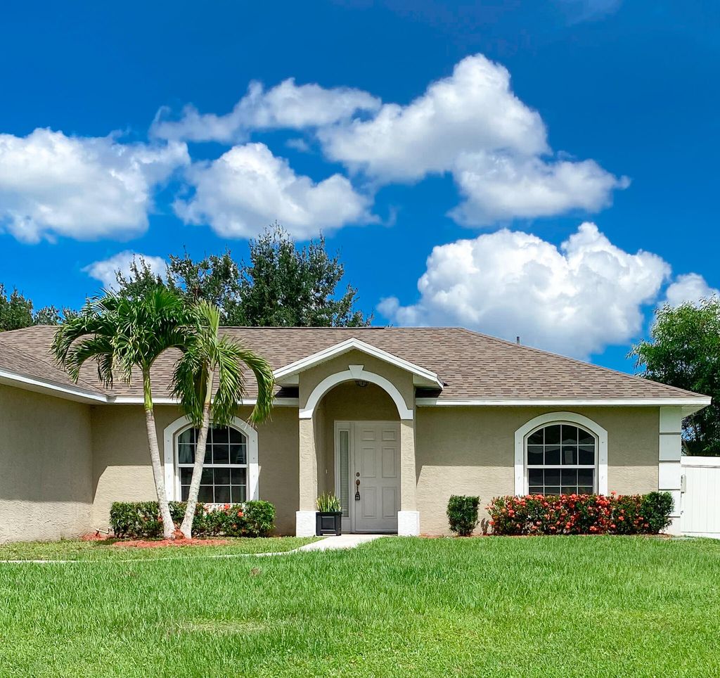 Photo of 5533 NW Cordrey Street, Port Saint Lucie, FL 34986 (MLS # R11101404)