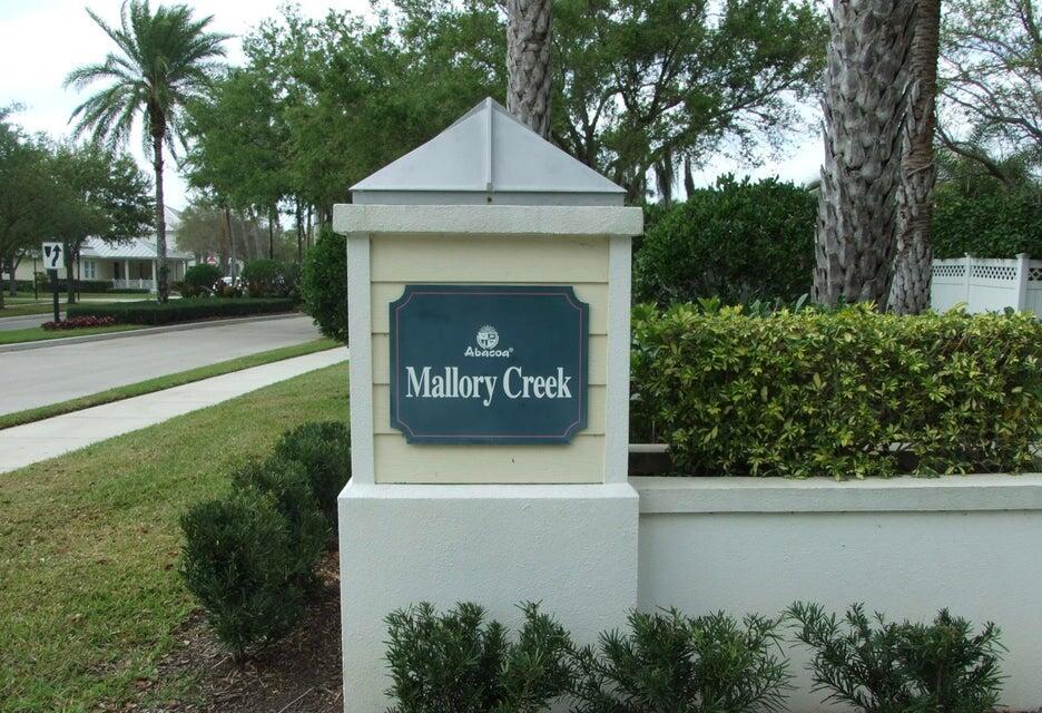 Popular Nautica model in the beautiful neighborhood of Mallory Creek - lives like a single family as it's the largest townhome at almost 1900 sq ft under air and with a private back patio makes it very expansive. Super clean unit with many upgrades including a new AC, diagonal tile downstairs and upstairs baths, new patio awning with wind sensor. Upgraded cabinets and granite countertops in kitchen and baths, Stainless steel appliances, laminate wood flooring in bedrooms and hallway, Features double wide master bedroom balcony, Impact windows throughout, Solar shade window treatments and plantation shutters.