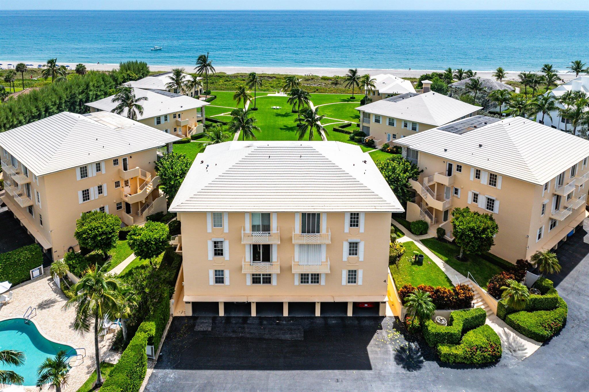 Nestled within the coveted Bermuda High South community, this oceanfront retreat blends sophistication with timeless coastal charm. Expansive gardens, sweeping ocean vistas, and a rare lot size set it apart. The professionally remodeled and decorated 2BR/2BA home features 9-ft ceilings, crown molding, a chef's kitchen with built-in bar/buffet, and stylish tile floors. An oversized covered patio opens to a private lawn, while impact glass and new sliding phantom screen doors offer both protection and comfort. Elegant window treatments, refined finishes, new AC (2022), custom closets, and a large garage storage room ensure convenience and move-in readiness. Life here is defined by coastal serenity-stroll through sea grapes and