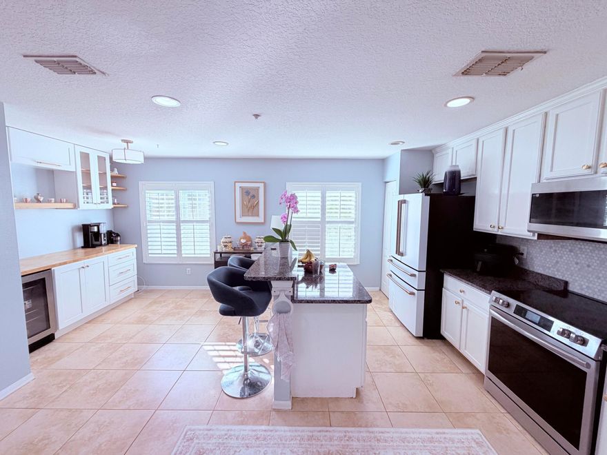 Create space for everyone in this 3BR/3.5BA townhome with nearly 2,000 sq ft of comfortable living. Each bedroom features its own private bath, offering ideal separation for growing families, teens, guests, or a home office. Enjoy morning coffee on the balcony overlooking peaceful lake. With a new roof (2025), updated kitchen (newer appliances) this home is truly move-in ready. Low-maintenance living with HOA covering roof, exterior paint, cable, internet & lawn care--all close to shopping, dining, schools, and the beach