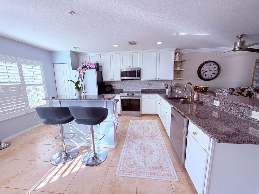 Photo of 1890 SE Interlachen Drive, Port Saint Lucie, FL 34952 (MLS # R11160182)