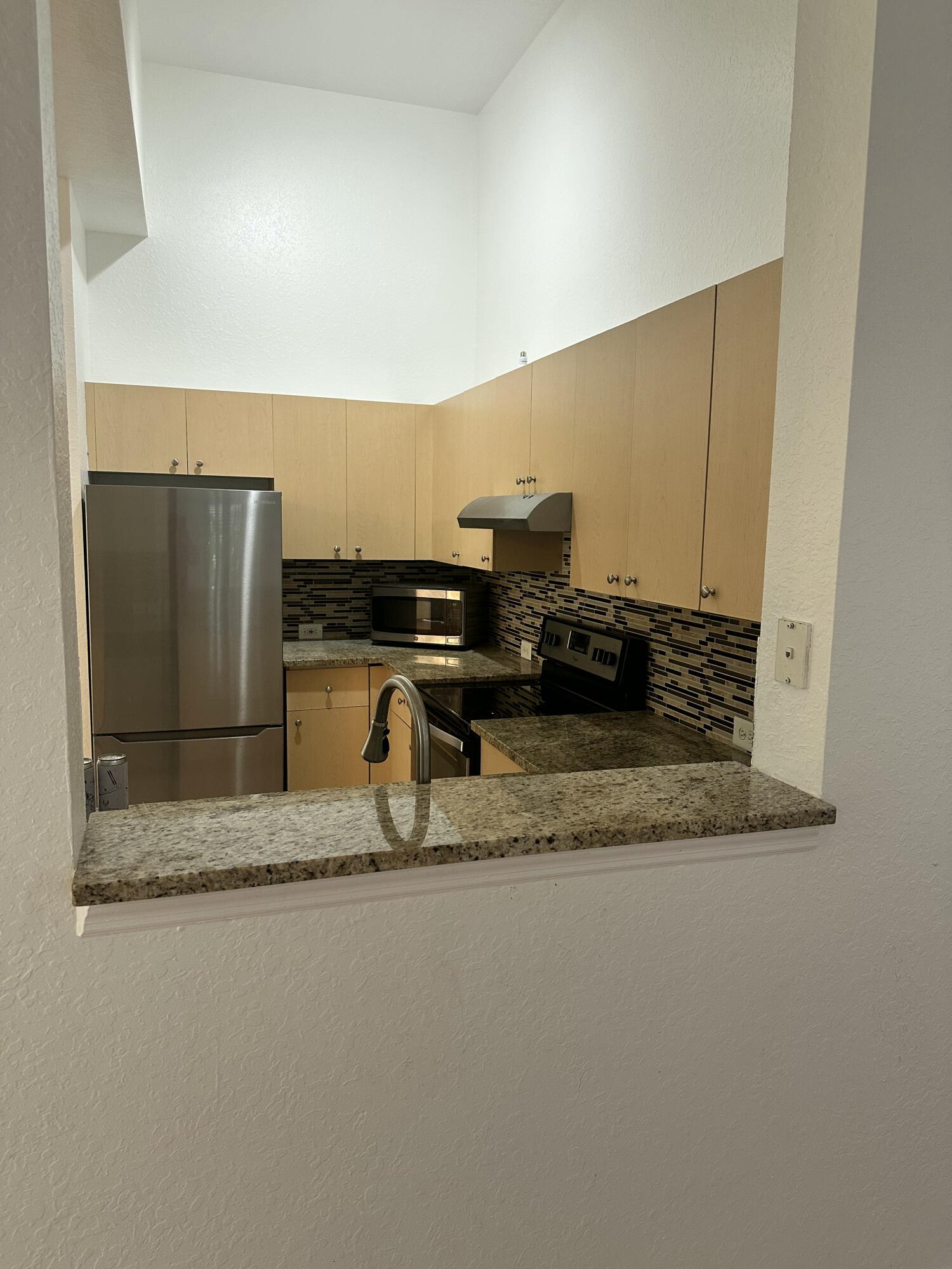 KENSINGTON OF ROYAL PALM BEACH CONDOI - Residential Lease
