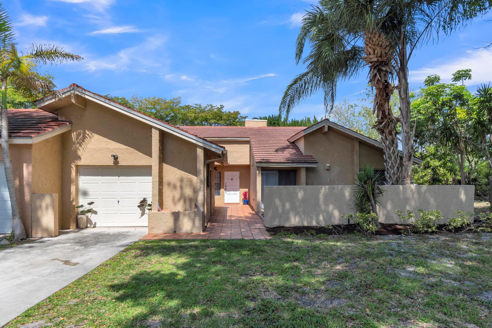 Welcome to this beautifully updated 3-bedroom, 2-bathroom villa with a 1-car garage located in the desirable Boca Club Colony community! This spacious and inviting home is filled with thoughtful upgrades and modern comforts throughout. Step inside to enjoy smooth ceilings (no popcorn!), a cozy fireplace, and a light-filled kitchen with a skylight, stainless steel appliances, and even an extra refrigerator for added convenience. The open floor plan offers plenty of room to relax or entertain, with two private patios perfect for indoor-outdoor living. Additional features include a Nest doorbell, a 3-year-old A/C, and a digital sprinkler system to keep the yard lush. There's ample parking for guests and even room for a pool if you choose to add one in the future.