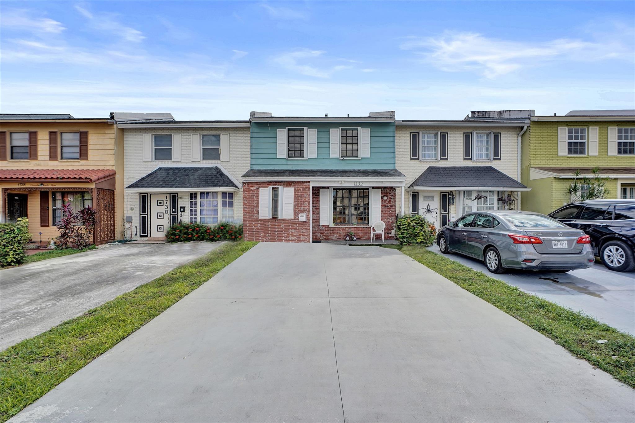 This is it! What a deal for this rarely available lakefront 3-bedroom, 2 bath townhome in the heart of Hialeah with NO HOA! This well-maintained home features a newer roof (2020), updated kitchen with modern appliances, newer A/C and water heater, and brand-new impact front and rear doors being installed.  1 bed/1 bath on the main level +  2 large bedrooms/1 bath upstairs. Full accordion shutter protection covers the rest of the property for peace of mind. Nice fenced in yard, with peaceful lake views.  Low maintenance and high flexibility; no rental restrictions and only $100/year to maintain the lake. Plenty of parking, desirable layout, fee simple, and an unbeatable location. Perfect for both end-users and investors! Do not miss this one and reach out to schedule your showing today.