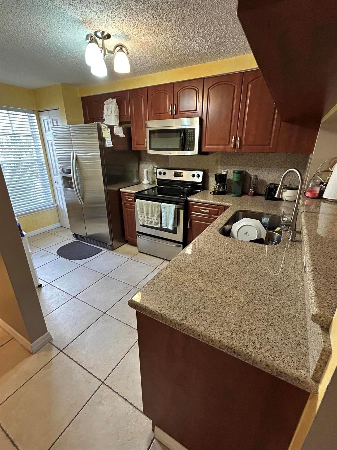 FIESTA CONDOMINIUMS INFAN - Residential Lease