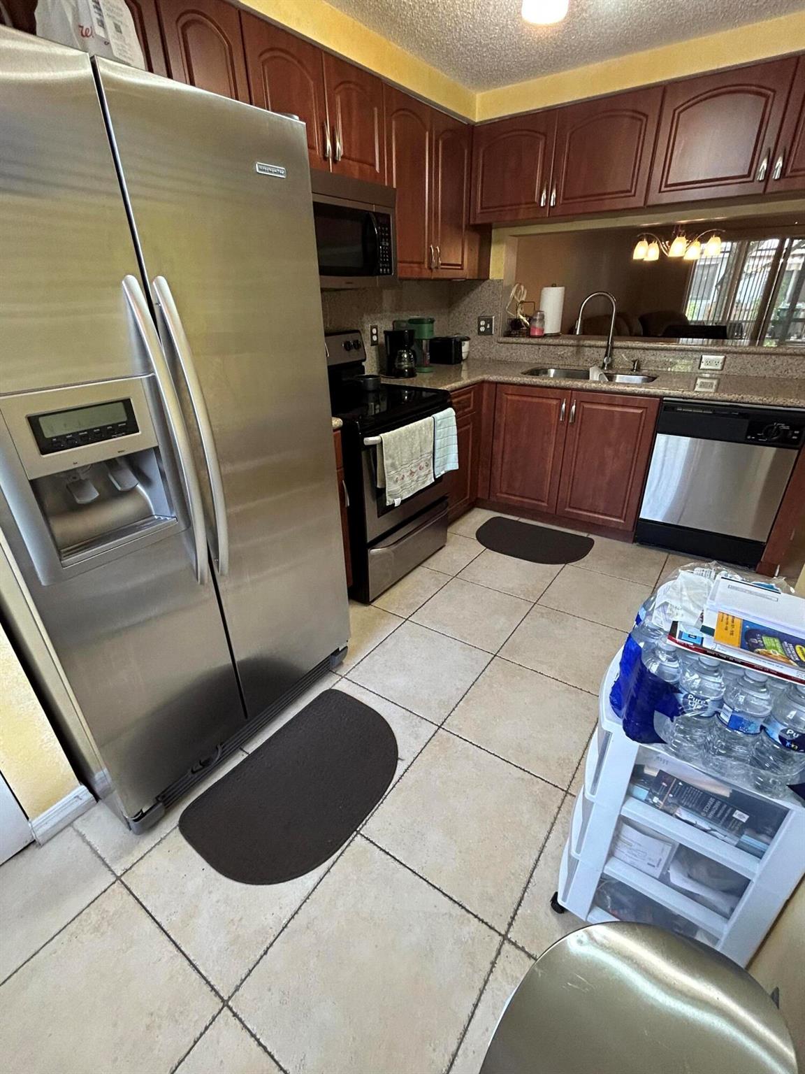 FIESTA CONDOMINIUMS INFAN - Residential Lease