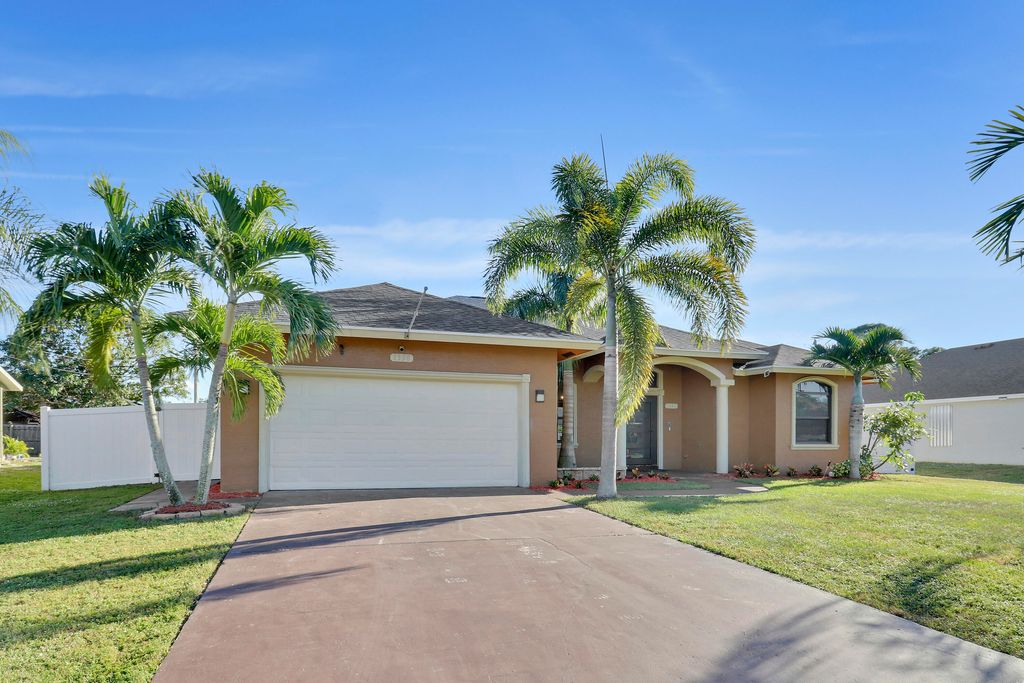 Photo of 1338 SW Hebner Avenue, Port Saint Lucie, FL 34953 (MLS # R11040911)