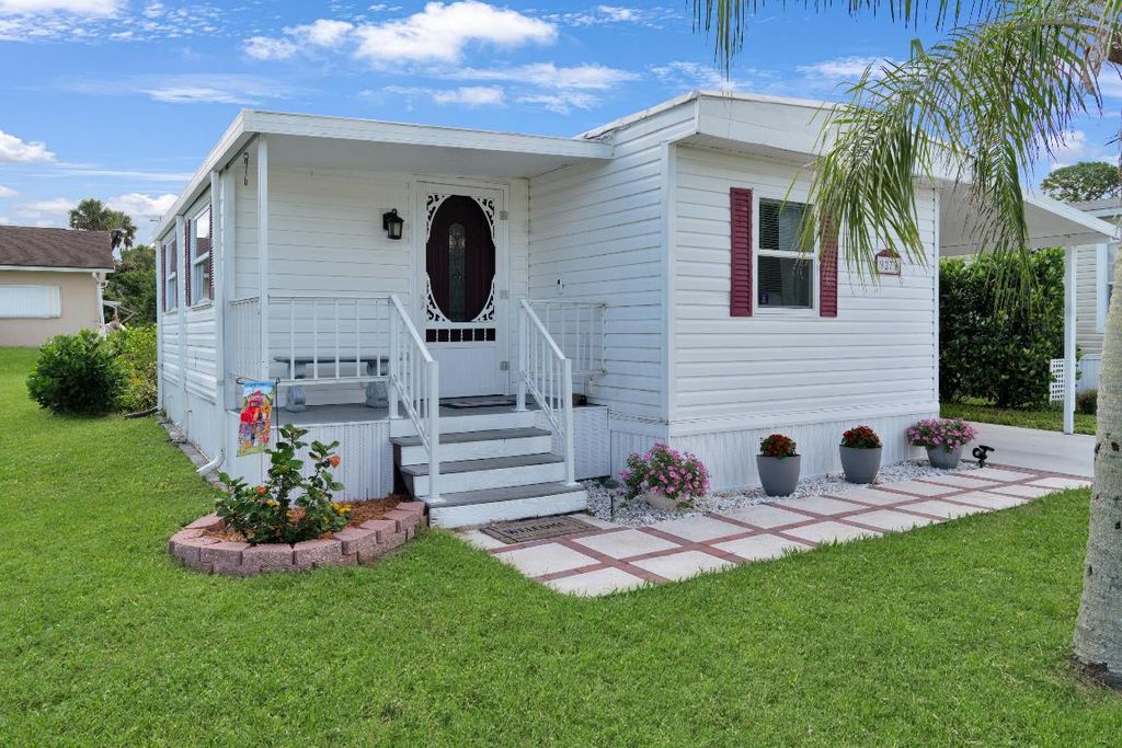 Photo of 9273 SW Mary Drive, Stuart, FL 34997 (MLS # R11126252)