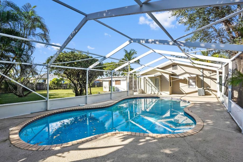 Photo of 3858 Lakewood Road, Palm Springs, FL 33461 (MLS # R11152732)