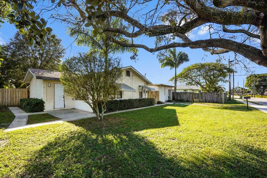 Welcome to this charming 1-story home in Lakewood Gardens, situated on an oversized 0.4327-acre corner lot with no HOA, Approved for for Multi-Family Zone, The main home offers 889 sq ft of living space featuring 2 bedrooms and 1 bathroom with tile flooring throughout and a screened pool perfect for relaxing or entertaining.

Property also includes an approx. 396 sq ft accessory suite (1 bed/1 bath) that is fire-damaged and not currently habitable. The accessory structure is concrete block construction and may offer future restoration/redevelopment potential. Sewer water is available but not yet connected. With ample yard space and a prime corner lot location, this home offers comfort, flexibility, and room to enjoy Florida living at its best.