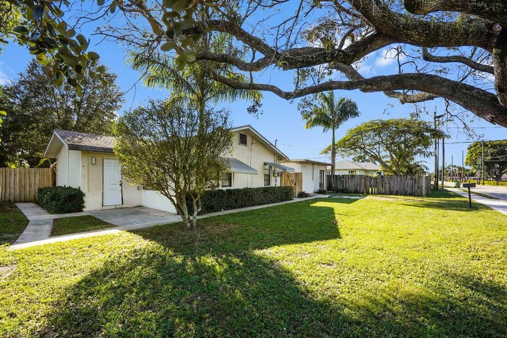 Photo of 3858 Lakewood Road, Palm Springs, FL 33461 (MLS # R11152732)