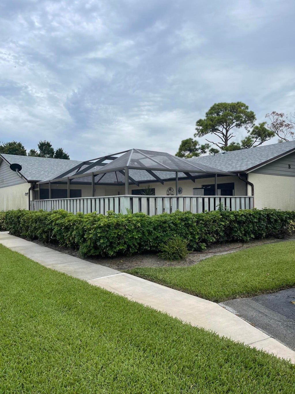 Photo of 1325 Peppertree Trail #B, Fort Pierce, FL 34950 (MLS # R11021046)
