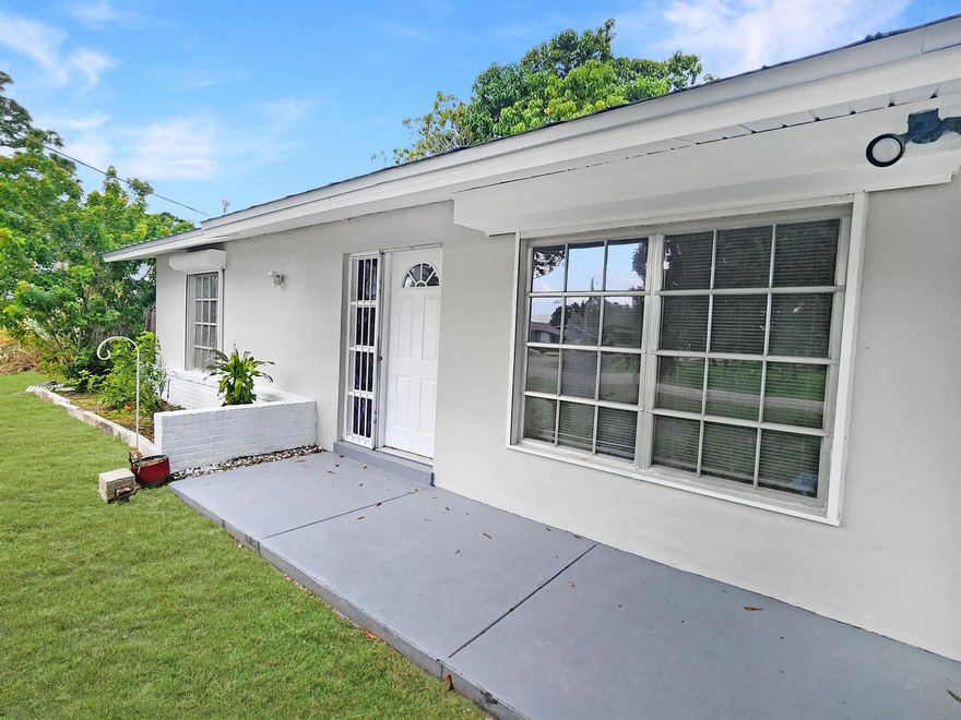 Perfect starter home centrally located in Port St. Lucie! This 2/2 solid built CBS charmer has been fully renovated and comes with a new metal roof, new garage door, and new water heater! Located on a beautiul treed lot than backs up to an easement for added privacy. Backyard fenced area makes the perfect play area for your pets! Appliances on order!