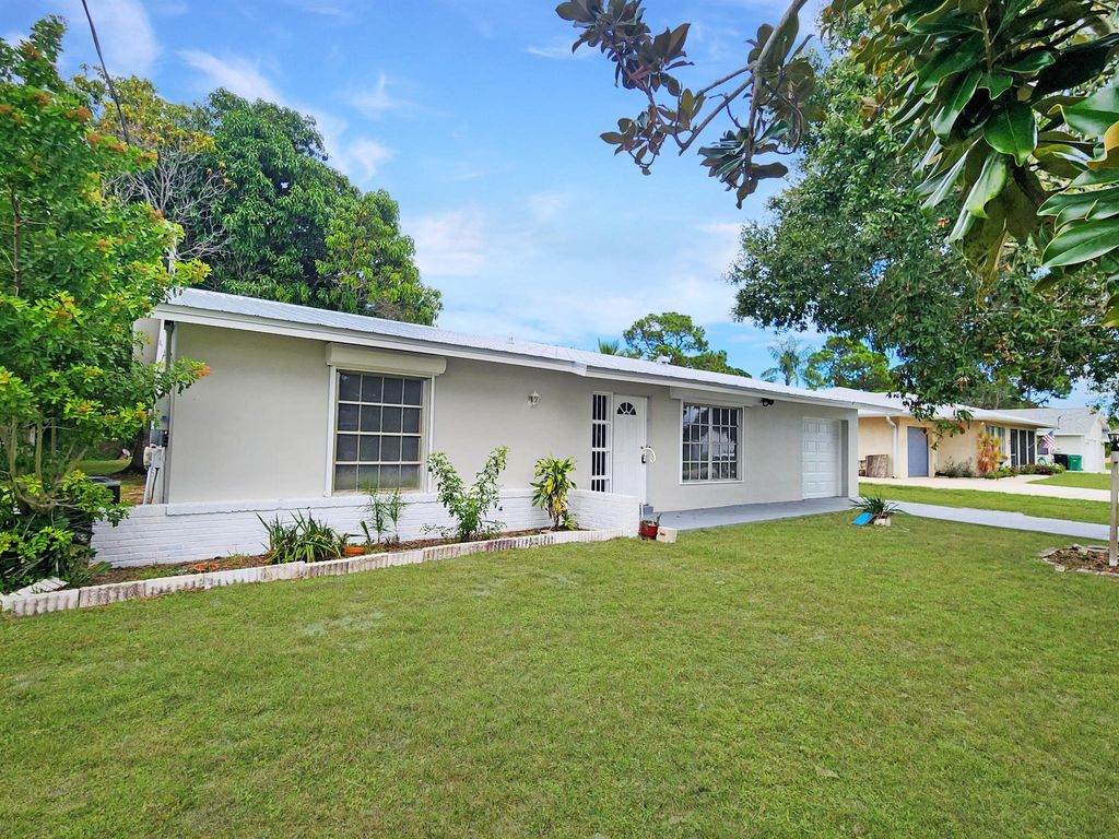 Photo of 199 SW Todd Avenue, Port Saint Lucie, FL 34953 (MLS # R11136749)