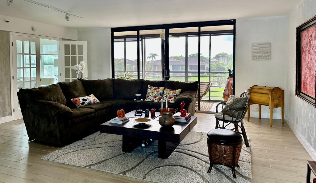 Photo of 7582 Regency Lake Drive, Boca Raton, FL 33433 (MLS # B26036340)